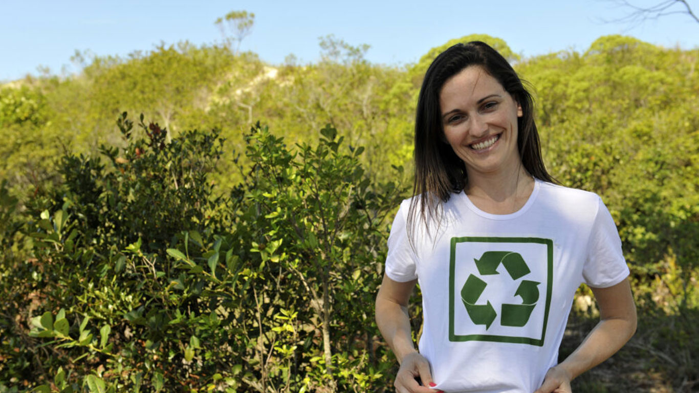 Smiling-Woman-Weating-a-Recycle-Logo-Tshirt